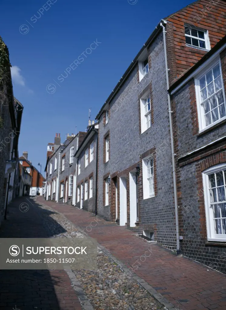England, East Sussex, Lewes, View Up Cobbled Old Street With Cottage Housing.