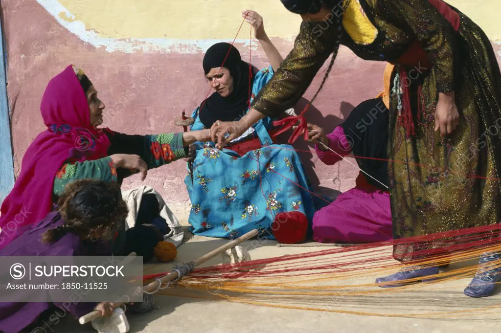 Egypt, Western Desert, People, Bedouin Women Spinning And Weaving.