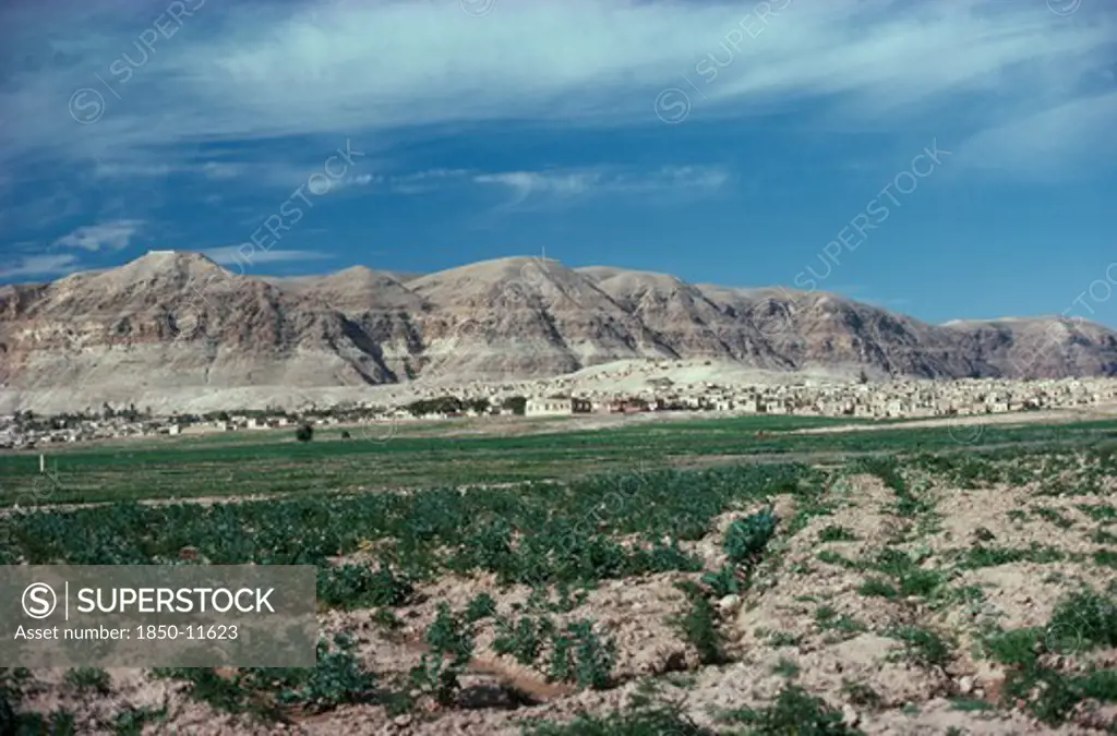 Israel, West Bank, View Over Landscape Toward The Judean Hills Near Jericho With Houses At The Base