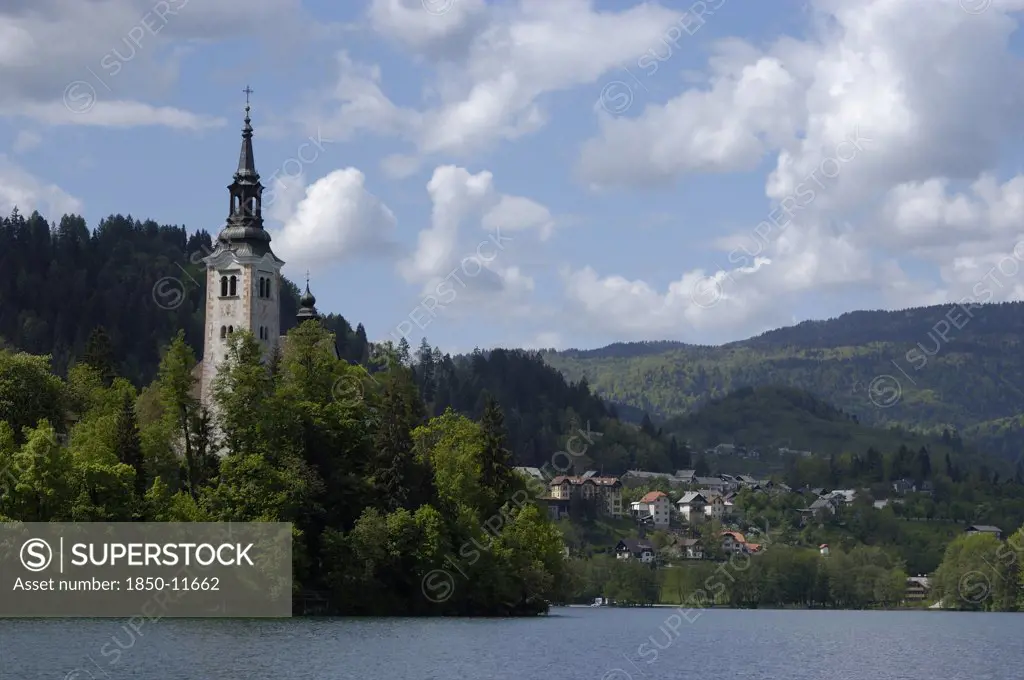 Slovenia, Lake Bled, View Over The Lake Toward Bled Island With The Tower Of The Church Of The Assumption Visible Above The Trees