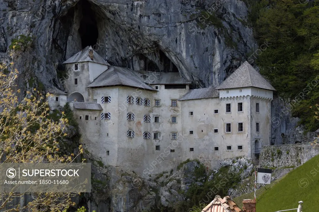 Slovenia, Predjama Castle, 16Th Century Castle Built Half Way Up 123M High Cliff