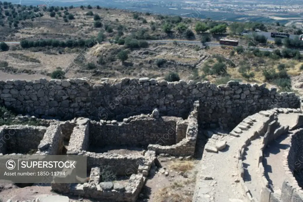 Greece, Peloponese, Mycenae, Ruins Of Granary Within Ancient Ruined Citadel.