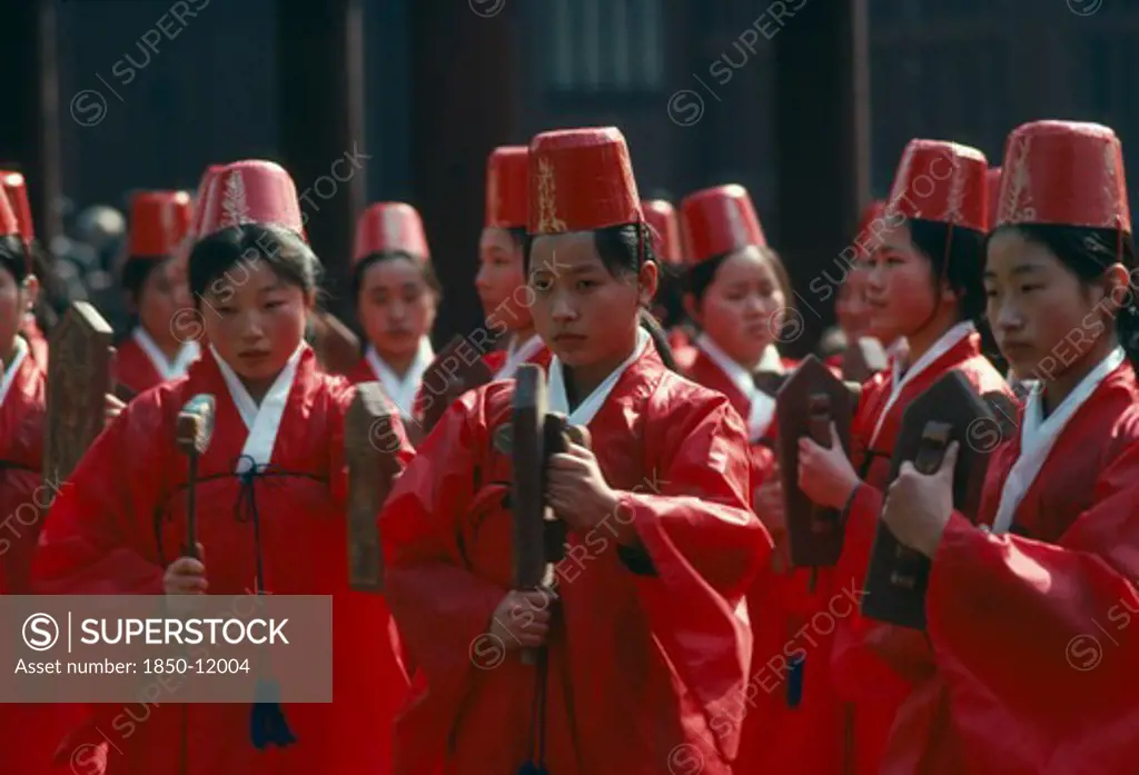 South Korea, Seoul, Sung Kyon Kwan University.  Sukcheon Ceremony To Consecrate Confucius.  Dancing By Traditional Eigtht Rows Of Eight Carrying Carved And Painted Rattles.