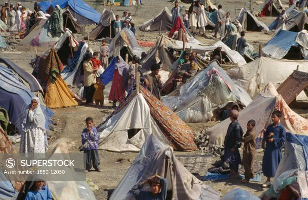 Pakistan, North West Frontier Province, 'Unhcr Camp For Refugees From Afghanistan.  Crowded Tents, Men, Women And Children.'