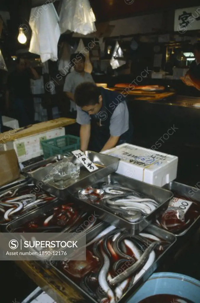 Japan, Honshu, Tokyo, Eels For Sale At Tsukiji Fish Market.