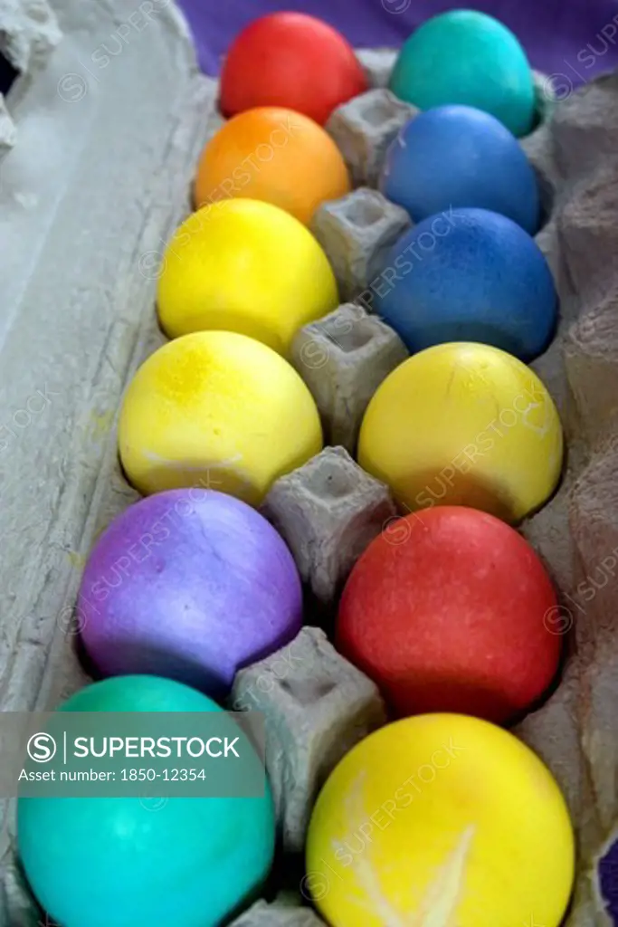 Usa, Minnesota, St Paul, A Dozen Dyed Easter Eggs In A Carton.