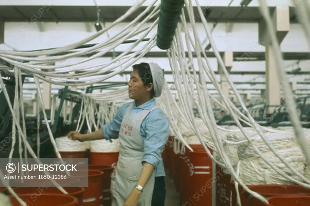 China, Industry, Woman Working In Cotton Factory.