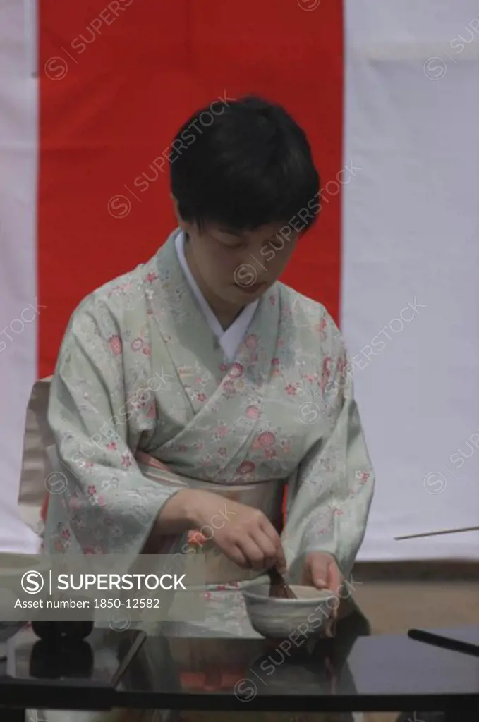 Japan, Chiba, Yokaichiba, 'Licensed Tea Master Chiharu Koshikawa Prepares Green Tea ''Macha'' At A Tea Ceremony, Wearing Kimono Mr'