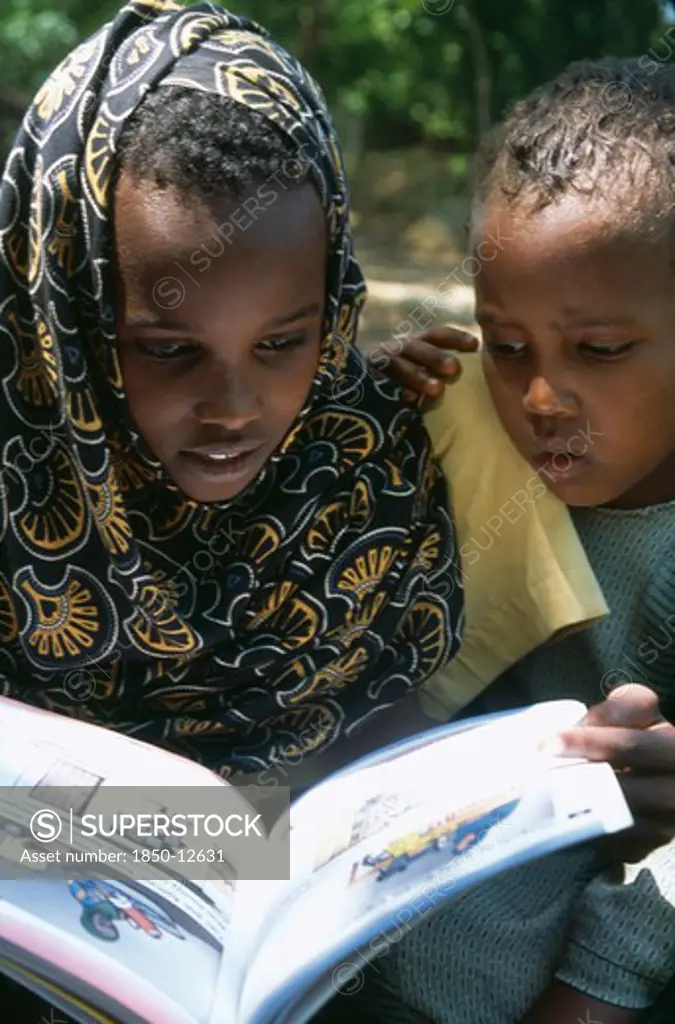 Somalia, Habare Village, Children Using New Somali Textbooks Produced By Unicef.