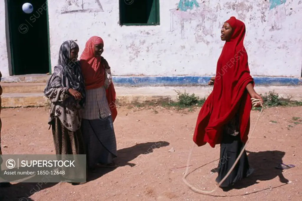Somalia, Baidoa, Girls Playing Skipping Games With Rope At Dr Ayub Primary School.