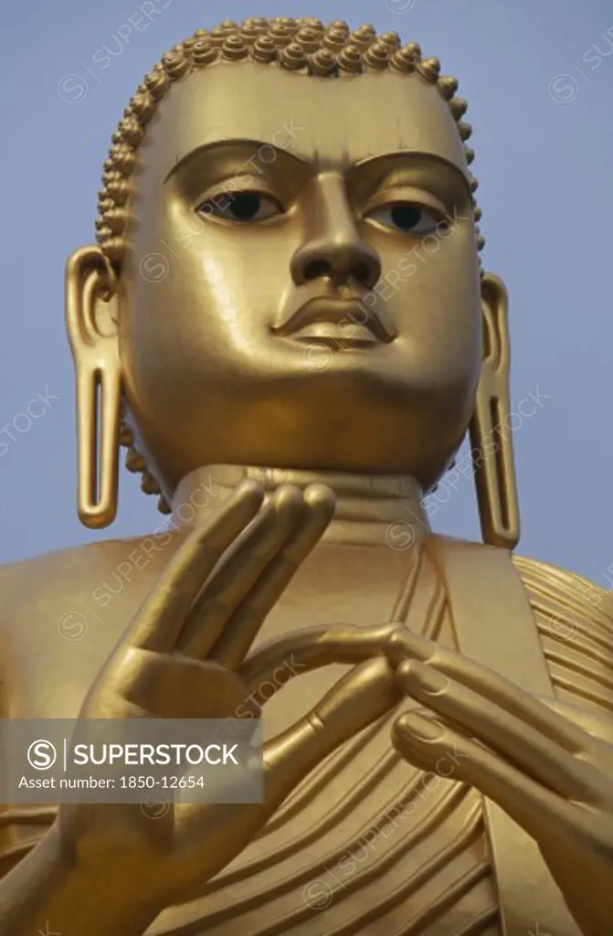 Sri Lanka, Dambulla, Face Of A Golden Buddha At The Buddhist Museum