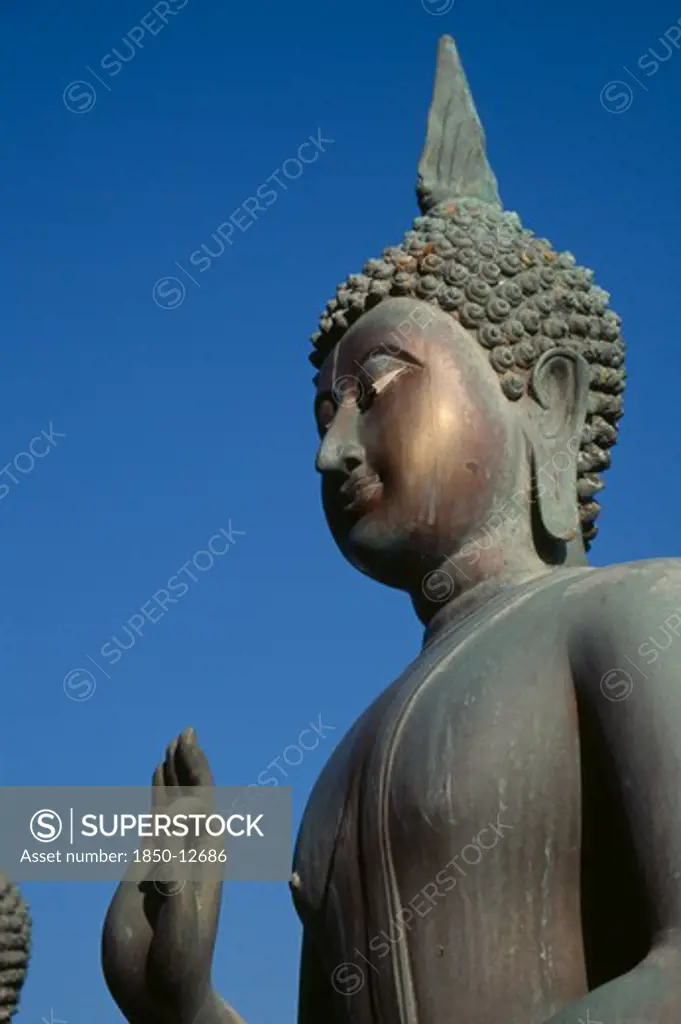 Sri Lanka, Colombo, Seema Malakaya On Beira Lake. Angled View Looking Up At The Head And Hand Of A Buddha Statue