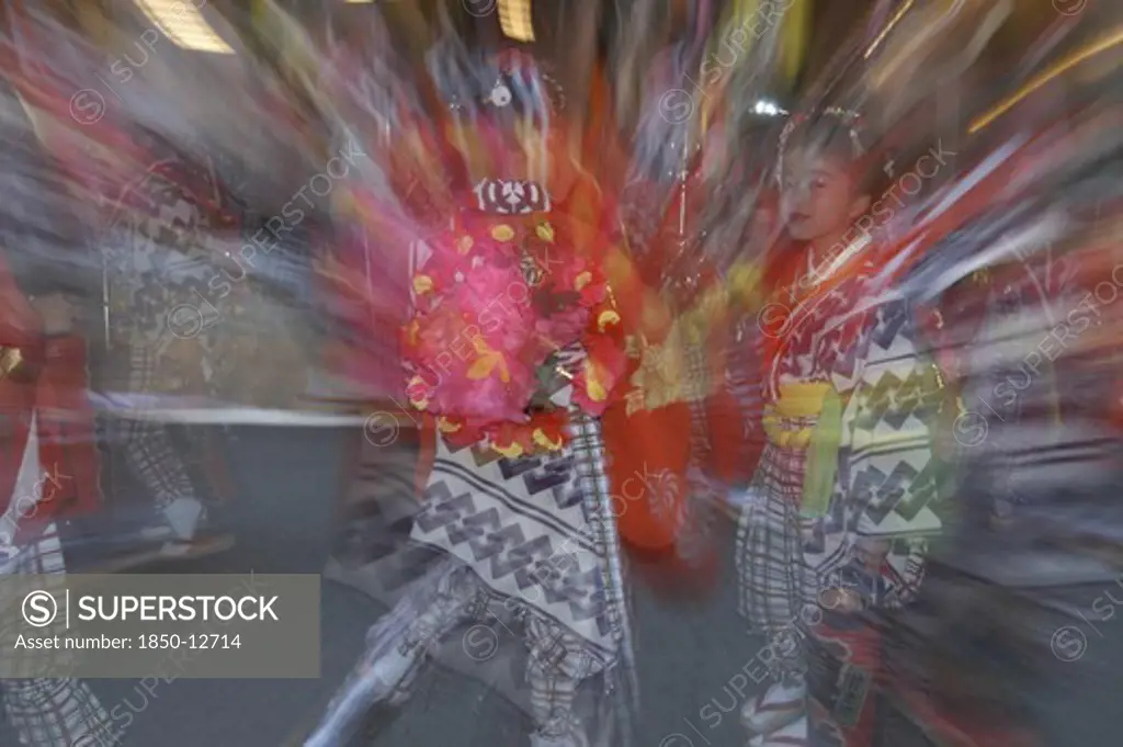 Japan, Chiba, Narita , '8-12 Year Old Girls Called ''Tekomae'' In Traditional Edo-Era Costumes, Wait To Proceed Their Neighborhood Dashi Or Wagon, Pulled Through The Streets During Gion Matsuri. Radial Blur.'