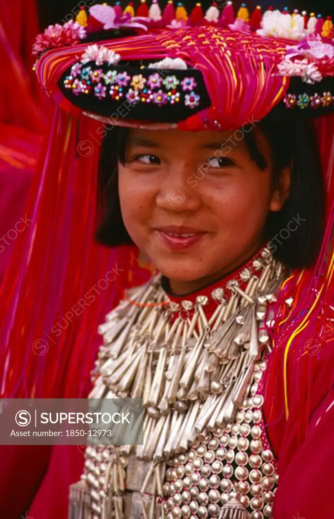 Thailand, Chiang Rai Province, Huai Khrai, Portrait Of A Young Lisu Girl In Her New Year Finery