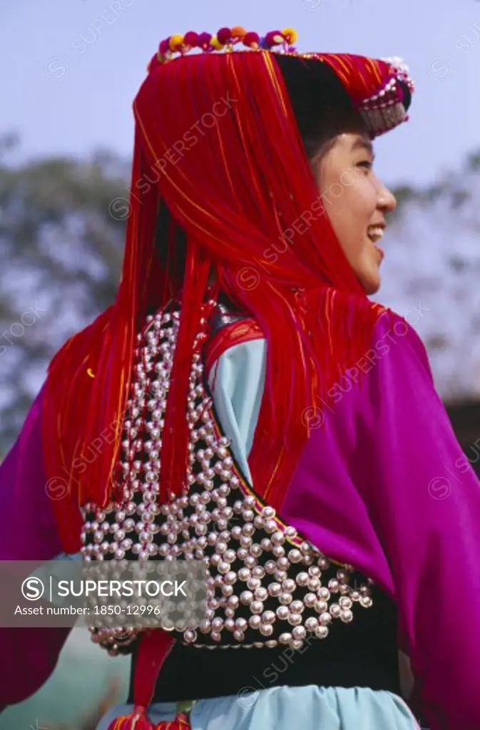 Thailand, Chiang Rai Province, Doi Lan, Back View Of A Young Lisu Woman Wearing Her New Year Finery