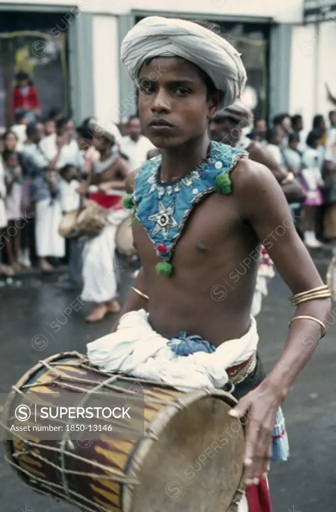 Sri Lanka, Kandy, Esala Perahera Festival Parade Drummer.