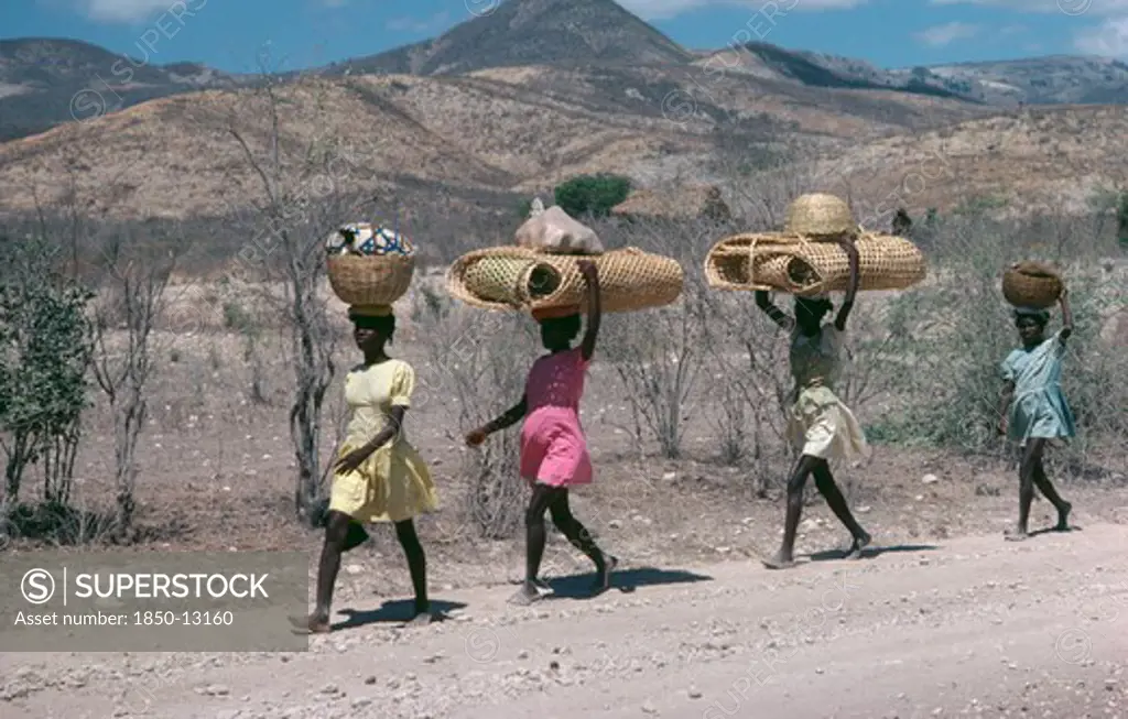 Haiti, Work, Line Of Girls Carrying Bags And Baskets On Their Heads.