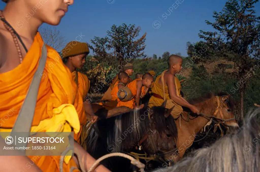 Thailand, Wat Phra Acha Tong, Novice Buddhist Monks From The Golden Horse Forest Monastery  Riding Out To Collect Alms And Preach The Evils Of Amphetamines Or Ya Ba.