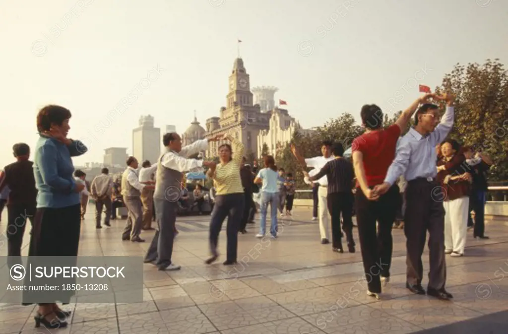 China, Shanghai, Early Morning Dancing On The Bund.