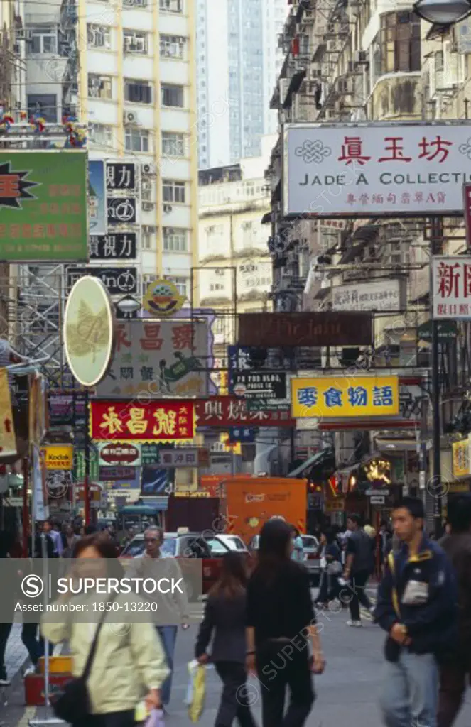 China, Hong Kong, 'Wanchi Busy Street Scene.  People, Traffic And Advertising Signs.'