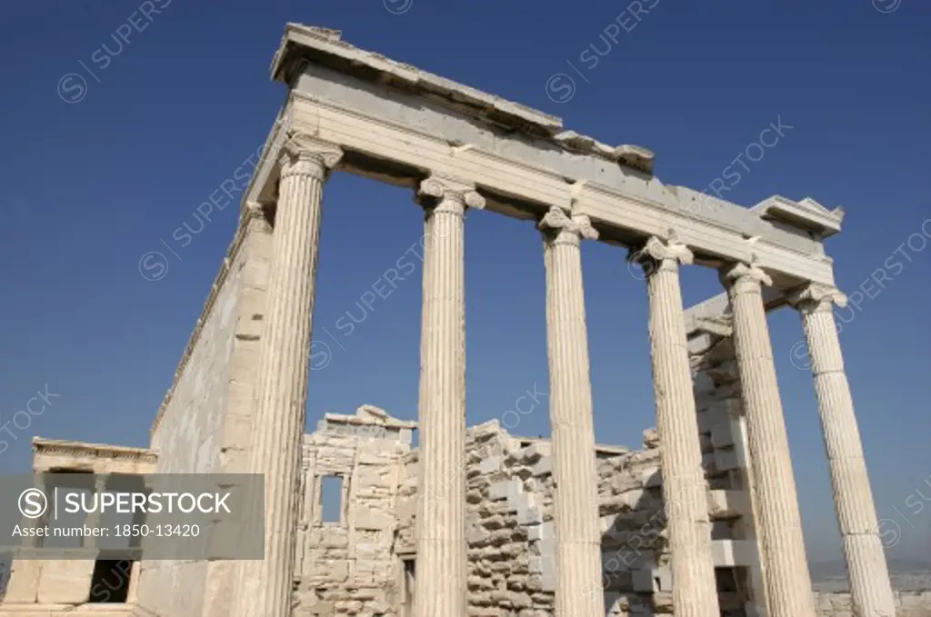 Greece, Athens, Acropolis. Angled View Of The Columns Of The Erechtheion Ruins