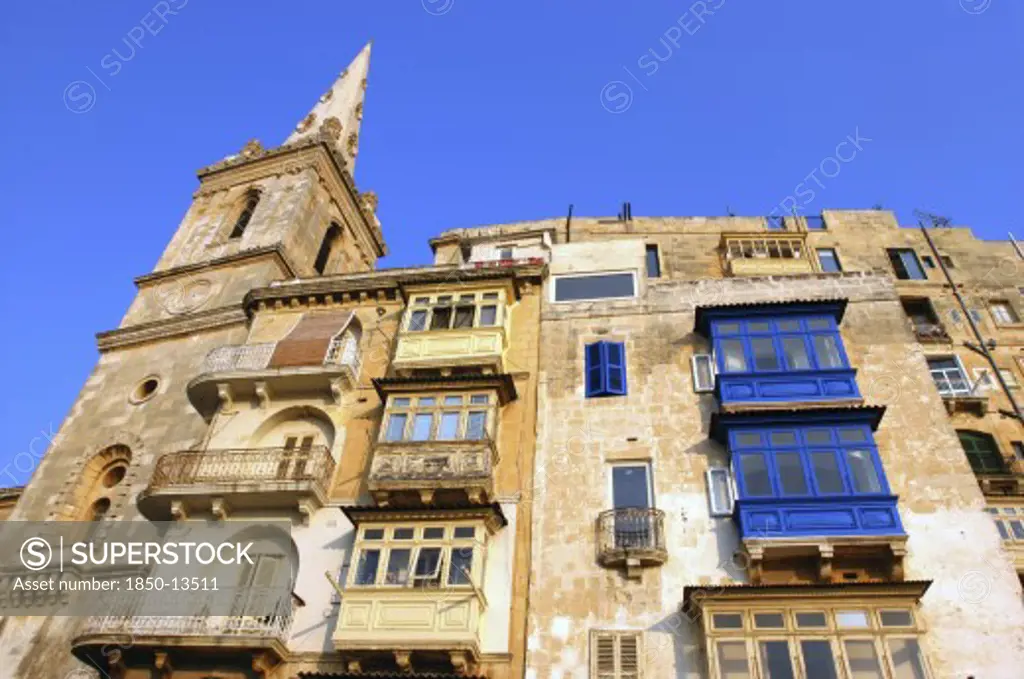 Malta, Valletta , Angled View Looking Up At Architectural Facade