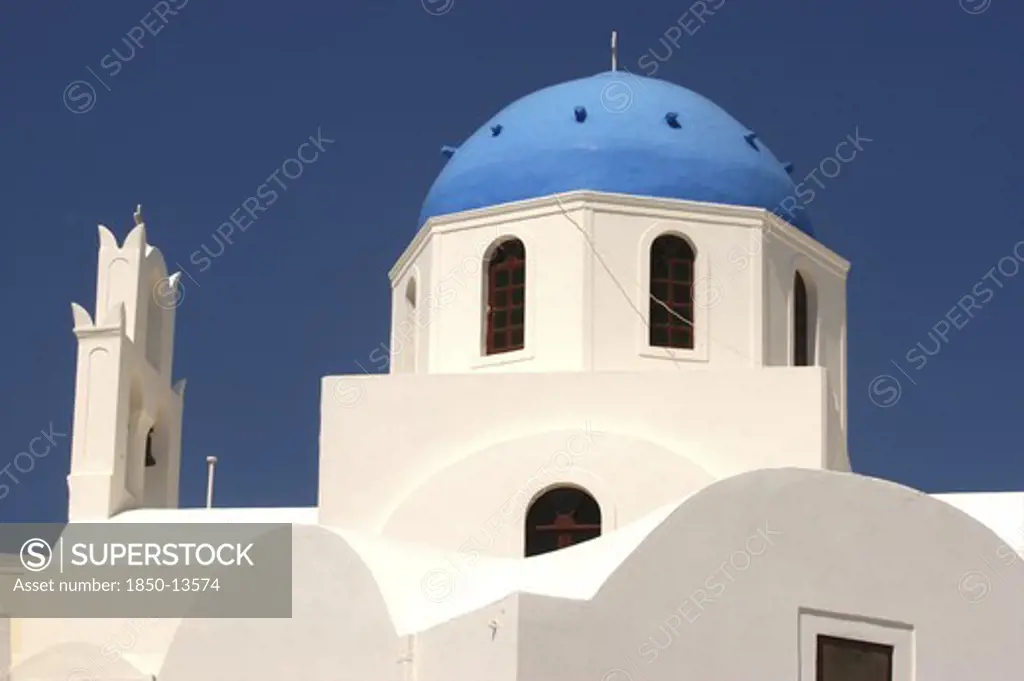 Greece, Cyclades, Santorini, Blue Domed Building With Whitewashed Walls
