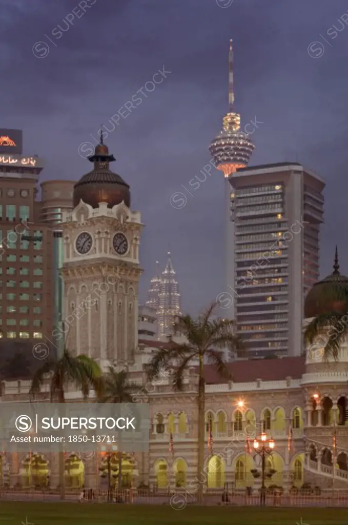 Malaysia, Kuala Lumpur, City Centre Skyline From Merdeka Square With The Sultan Abdul Samad Building In The Foreground The Menara Kuala Lumpur  And Petronas Towers Behind.