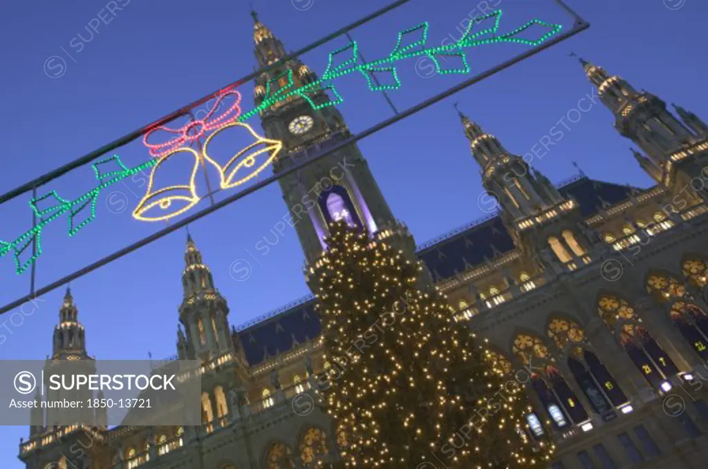 Austria, Vienna, Christmas Lights And Tree In Front Of The Rathaus During The Christmas Market.