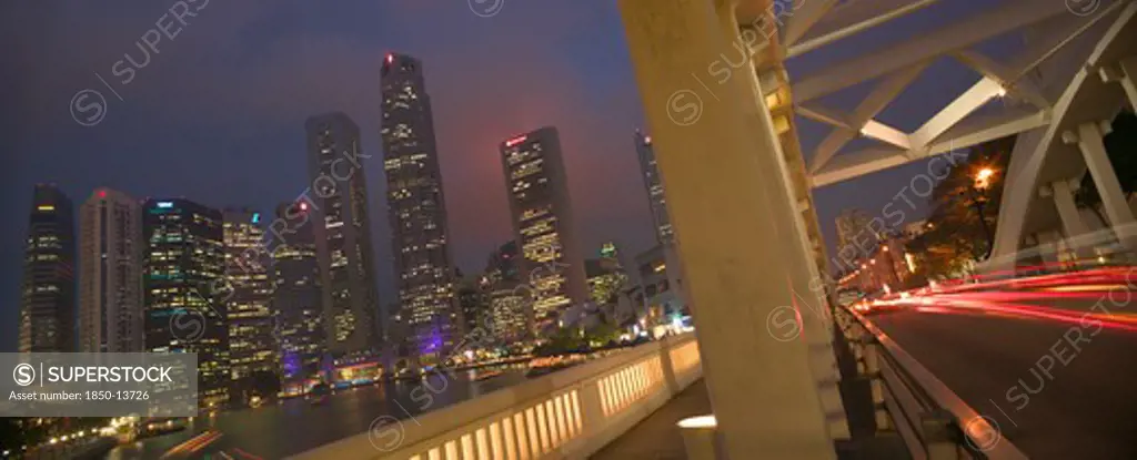 Singapore, , View Of The Skyscrapers Along The Singapore River From Elgin Bridge At Dusk.