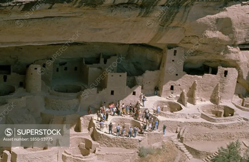Usa, Colorado, Mesa Verde Nat Park, View Of The Cliff Palace Which Is The Largest Anasazi Cliff Dwelling With Tourist Group