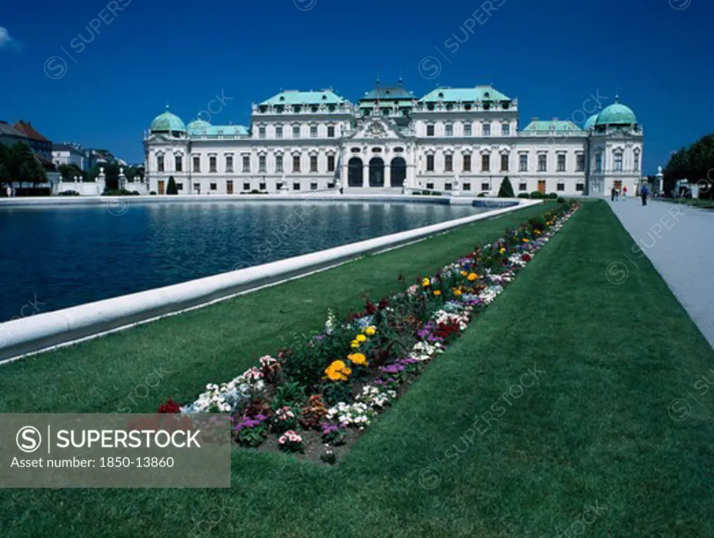 Austria, Vienna, Upper Belveder Palace Southern Facade Seen Over Large Pool In The Gardens