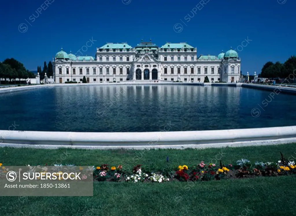 Austria, Vienna, Upper Belveder Palace Southern Facade Seen Over Large Pool In The Gardens