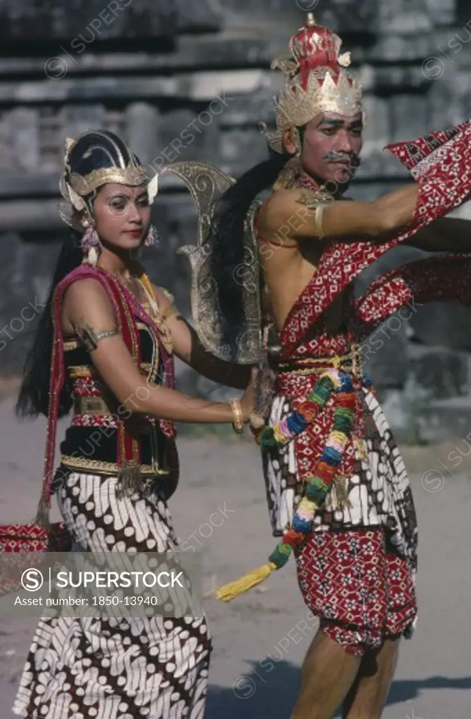 Indonesia, Java, Couple In Elaborate Costume Performing Ramayana Dance.