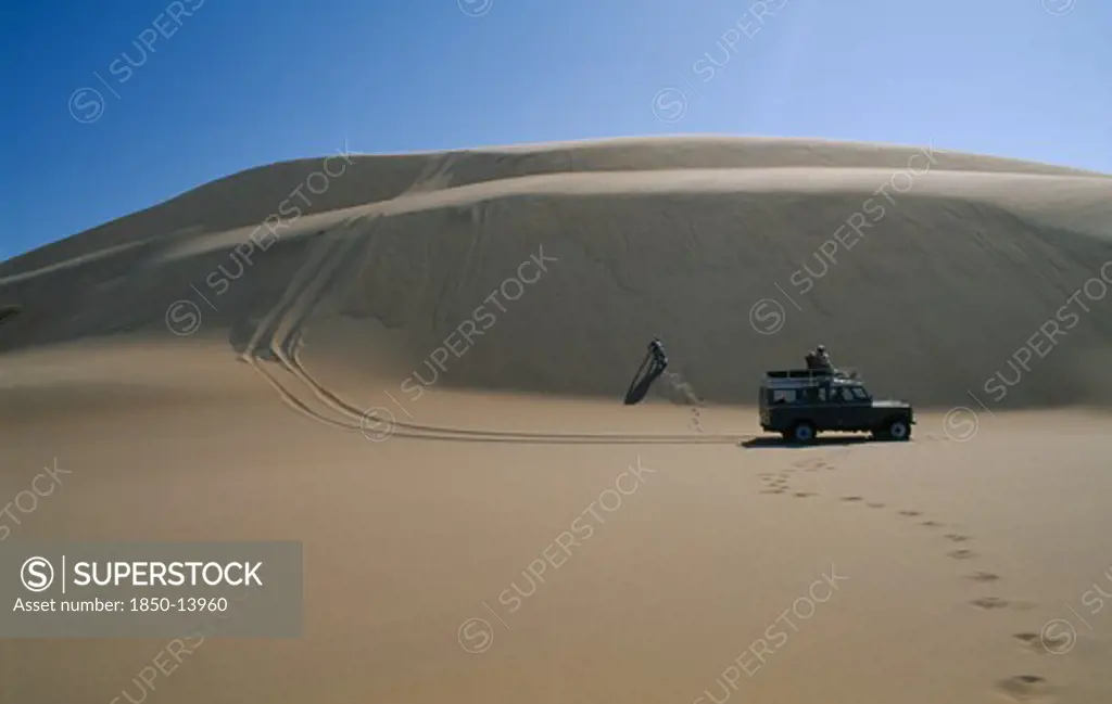 Namibia, Skeleton Coast, Terrace Bay, Dune Driving With Jeep On The Roaring Dunes.