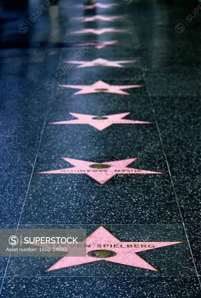 Usa, California, Los Angeles, Hollywood. Pink Marble And Bronze Stars Embedded Into Hollywood Boulevard Sidewalk Aka Hollywood Walk Of Fame
