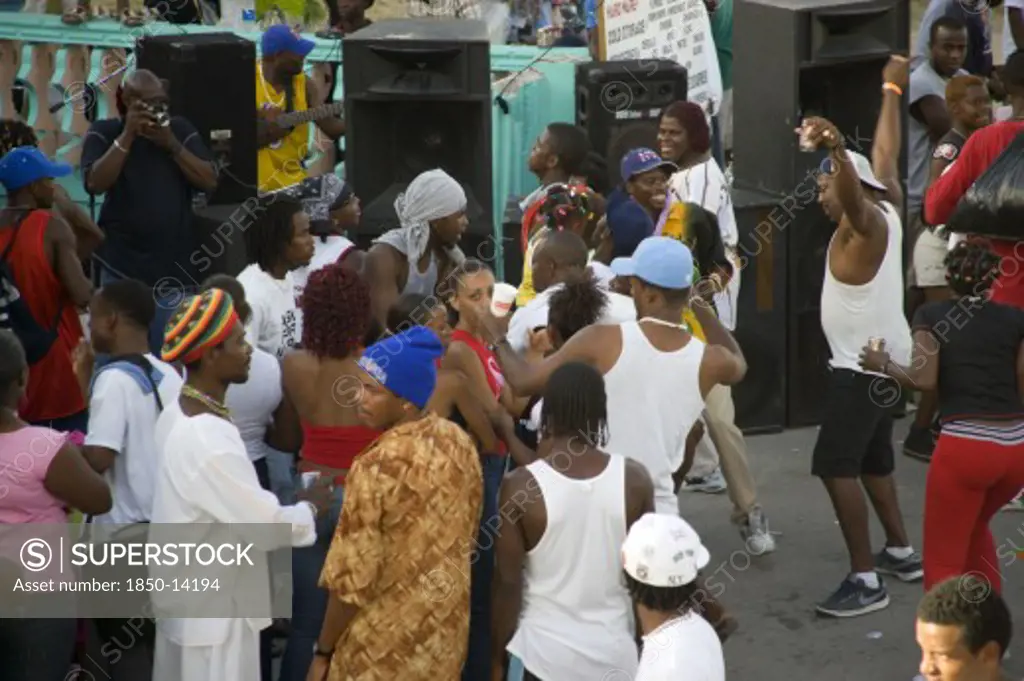 West Indies, St Vincent & The Grenadines, Union Island, People Dancing Beside Sound System At Easterval Easter Carnival In Clifton