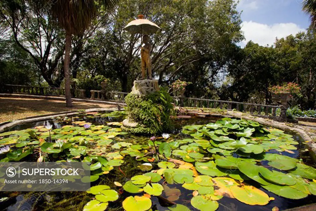 West Indies, Barbados, St George, Francia Plantation House Gardens And Waterlilly Pond With Fountain