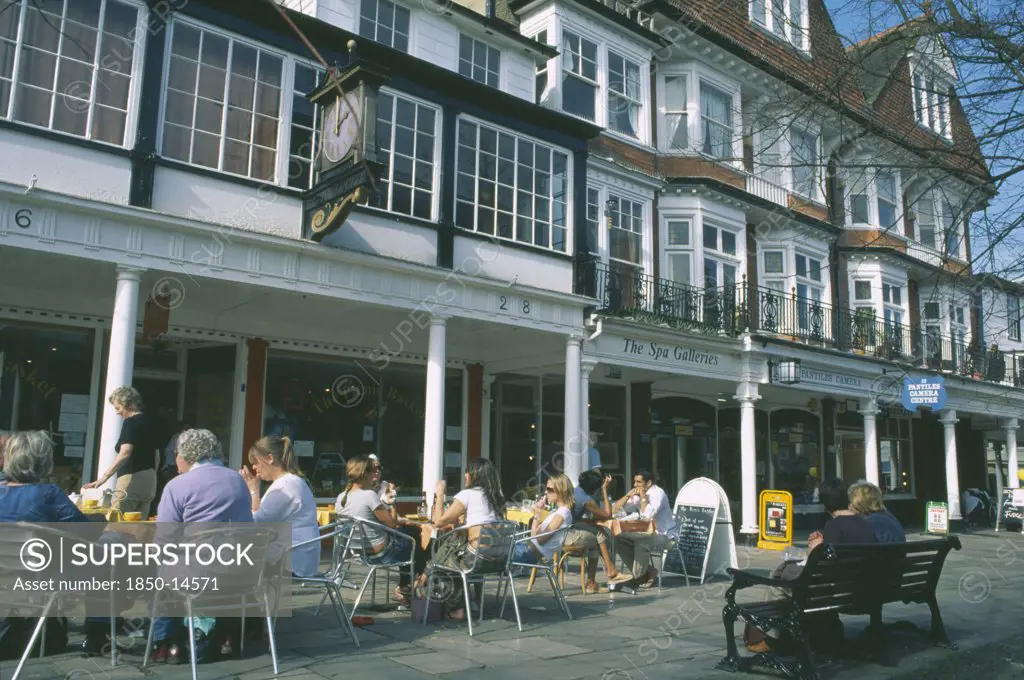 England, Kent, Tunbridge Wells, The Pantiles. Cafe With Outside Seating And People Sat At Tables.