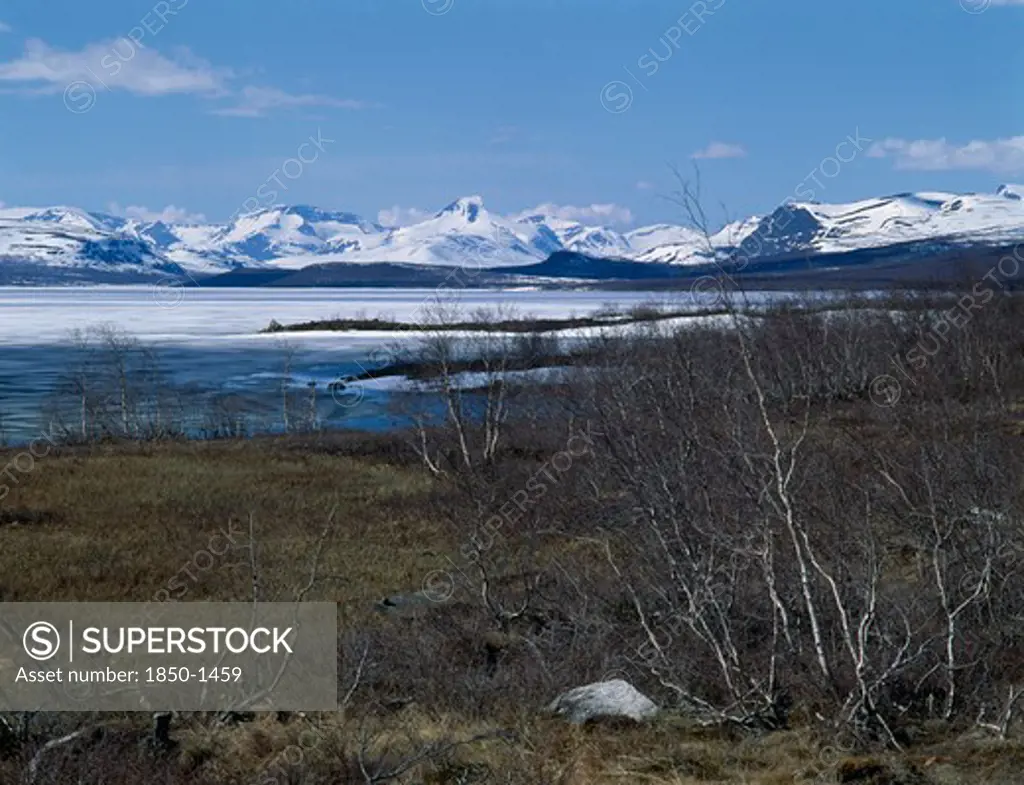 Finland, Lapland, ' Kilpisjarvi     West View Norway,Way Of The Four Winds,Lake Snow Capped Peaks '