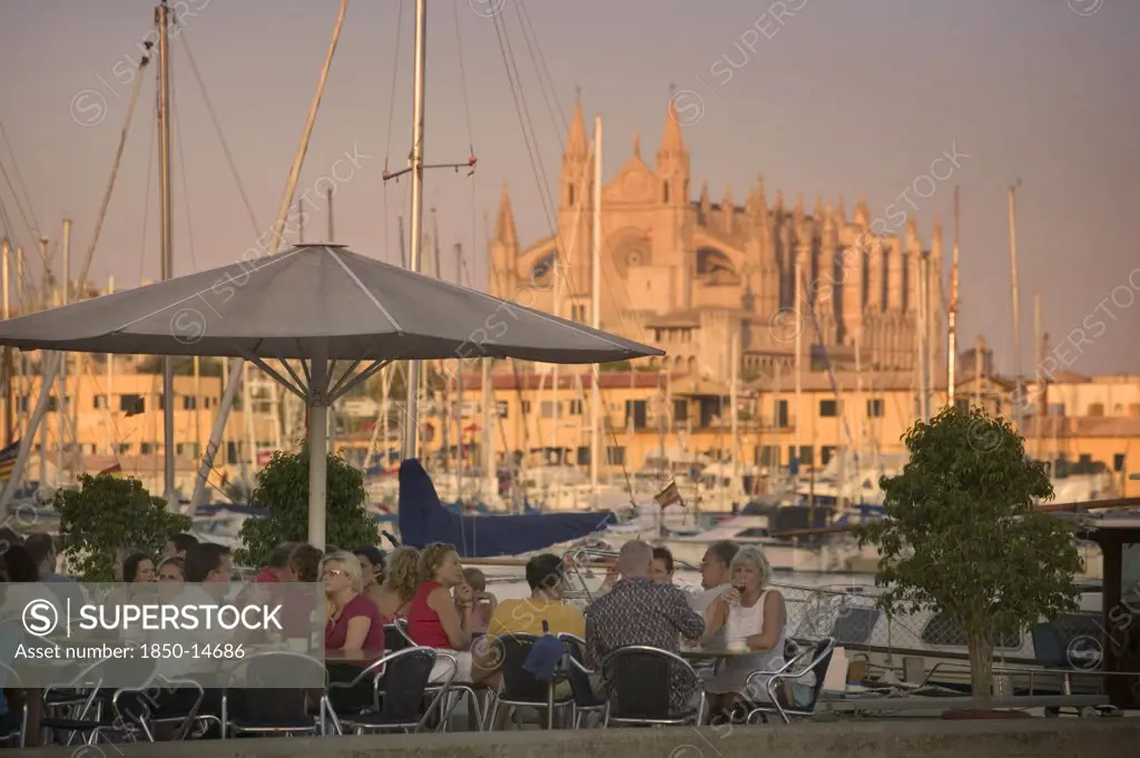 Spain, Balearic Islands, Mallorca, 'Palma De Mallorca, Cafe Next To The Port With The Cathedral Behind.'