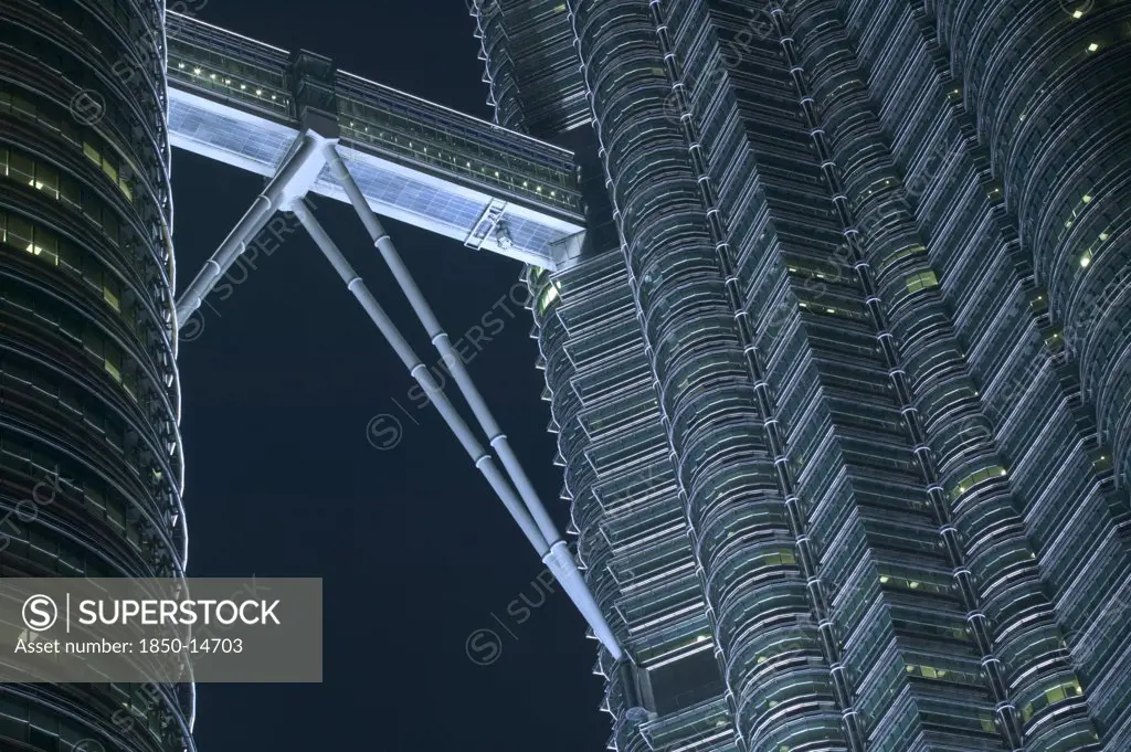 Malaysia, Peninsular, Kuala Lumpur,  Detail Of The Petronis Towers At Night Showing Walkway Between The Two Towers.