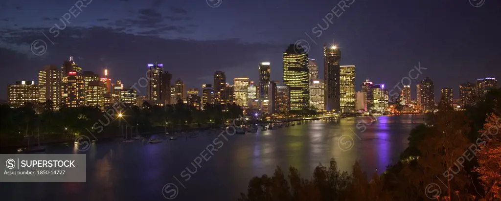 Australia, Queensland, Brisbane, Panoramic View Of The City Across The Brisbane River As Dusk Falls.