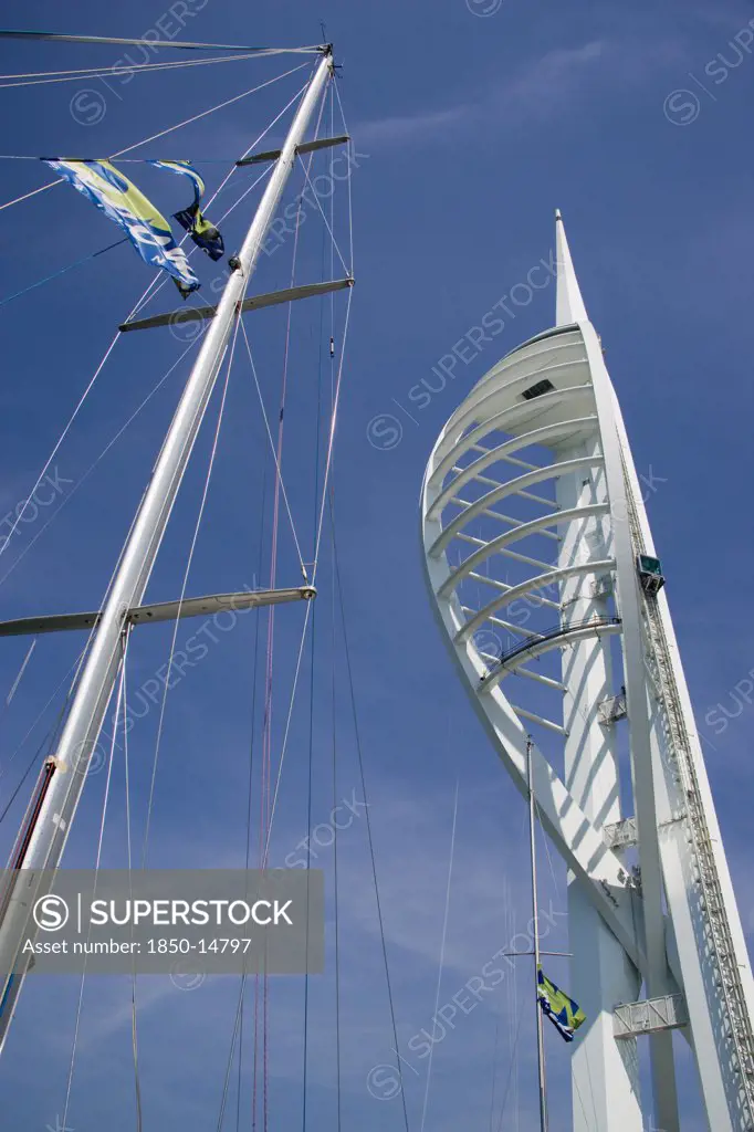 England, Hampshire, Portsmouth, The Spinnaker Tower The Tallest Public Viewing Platforn In The Uk At 170 Metres On Gunwharf Quay With Yachts Mast In The Foreground