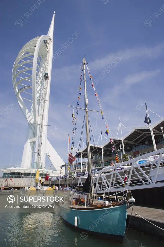 England, Hampshire, Portsmouth, The Spinnaker Tower The Tallest Public Viewing Platforn In The Uk At 170 Metres On Gunwharf Quay With Moorings In The Foreground