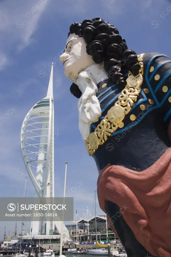 England, Hampshire, Portsmouth, The Spinnaker Tower The Tallest Public Viewing Platforn In The Uk At 170 Metres On Gunwharf Quay With Old Ships Bowspit Figurehead In The Foreground