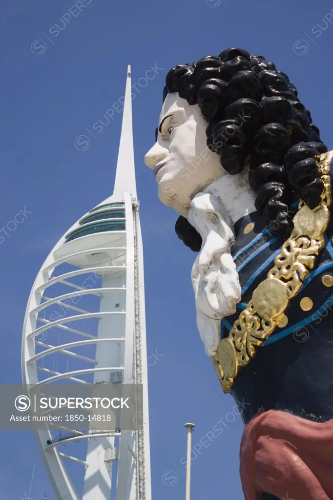 England, Hampshire, Portsmouth, The Spinnaker Tower The Tallest Public Viewing Platforn In The Uk At 170 Metres On Gunwharf Quay With Old Ships Bowspit Figurehead In The Foreground