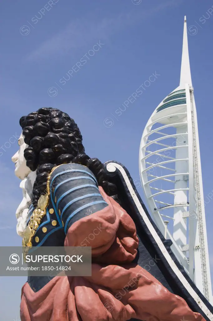 England, Hampshire, Portsmouth, The Spinnaker Tower The Tallest Public Viewing Platforn In The Uk At 170 Metres On Gunwharf Quay With Old Ships Bowsprit Figurehead In The Foreground
