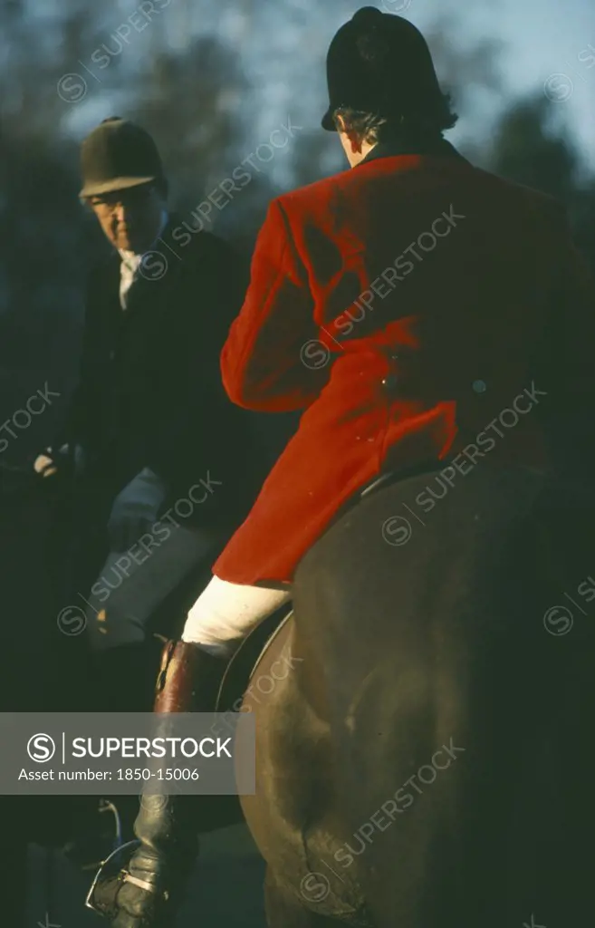 Sport, Equestrian, Foxhunting, Riders On Horseback With Male Rider Wearing Traditional Red Coat Also Known As Hunting Pink.