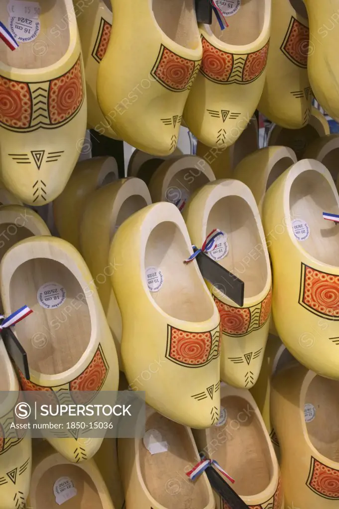 Holland, Shoe Display, Clogs For Sale With Painted Detail And Hanging In Rows.